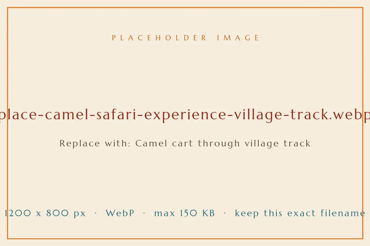 A camel pulling a flat cart of passengers along a village track outside Pushkar